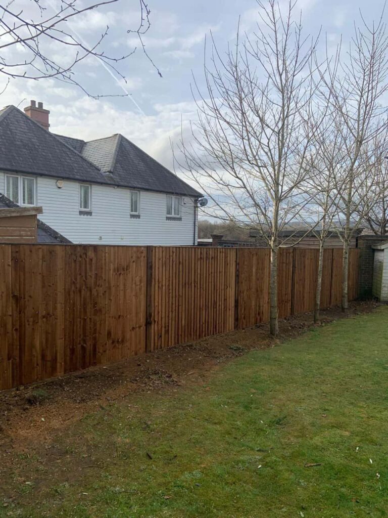 This is a photo of feather edge fencing installed in a residential properties garden by Fast Fix Fencing Whittlesey